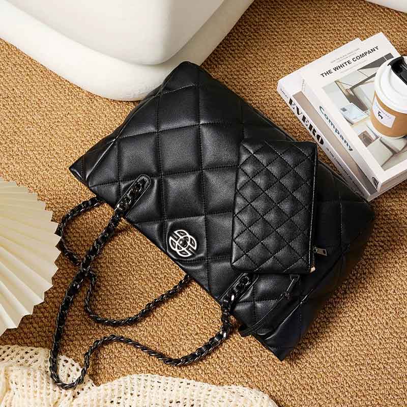 Black quilted handbag with chain strap