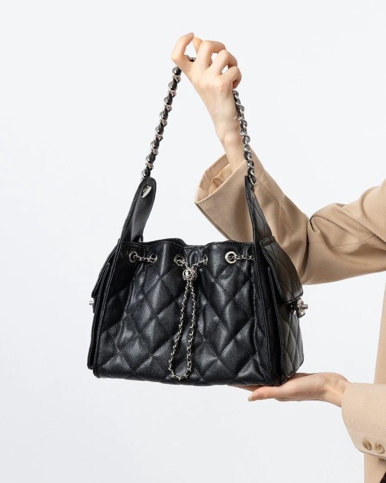 Cowhide Black quilted handbag with chain detail 
