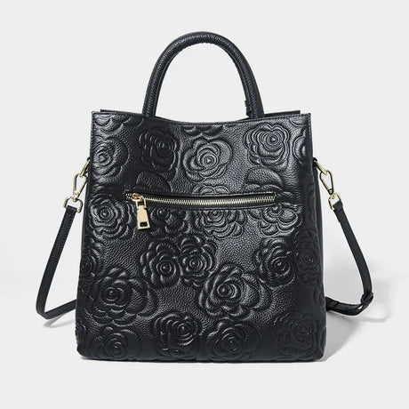 Cowhide Black floral embossed handbag