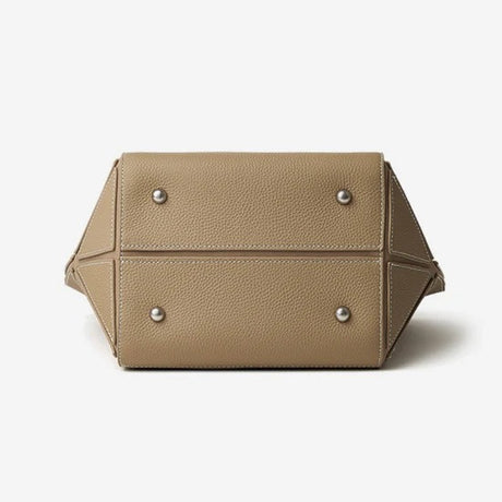 gray handbag bottom with silver buttons