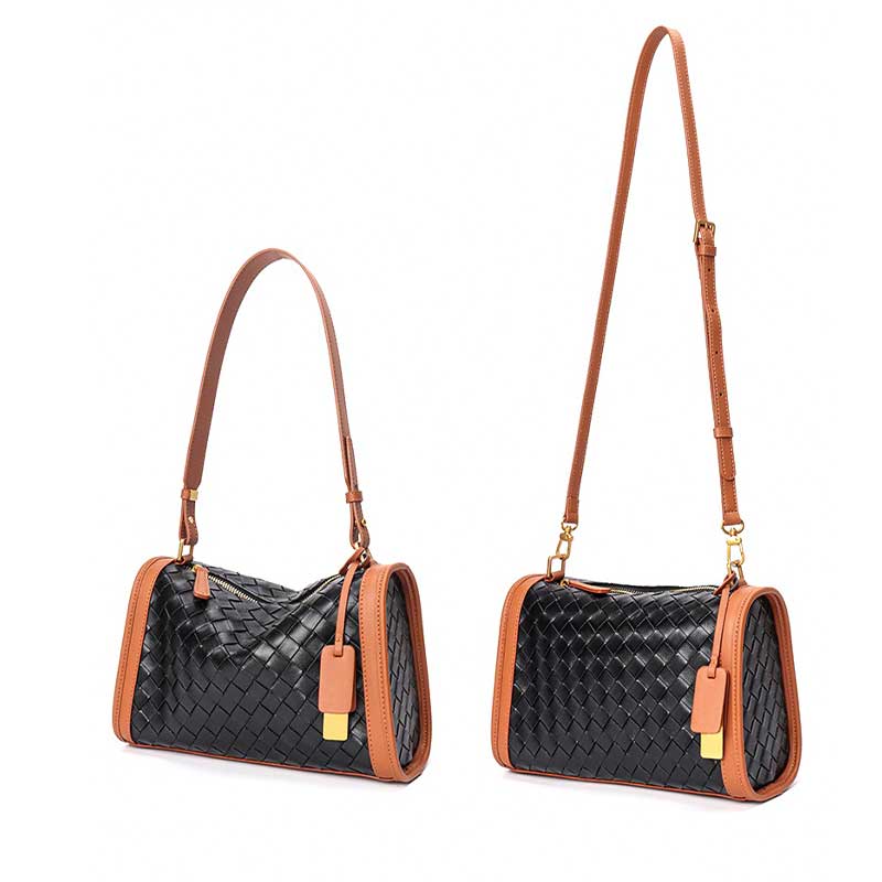 Black Woven handbag with brown leather straps 