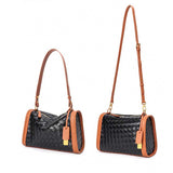 Black Woven handbag with brown leather straps 