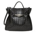 Black woven handbag with a silver clasp 