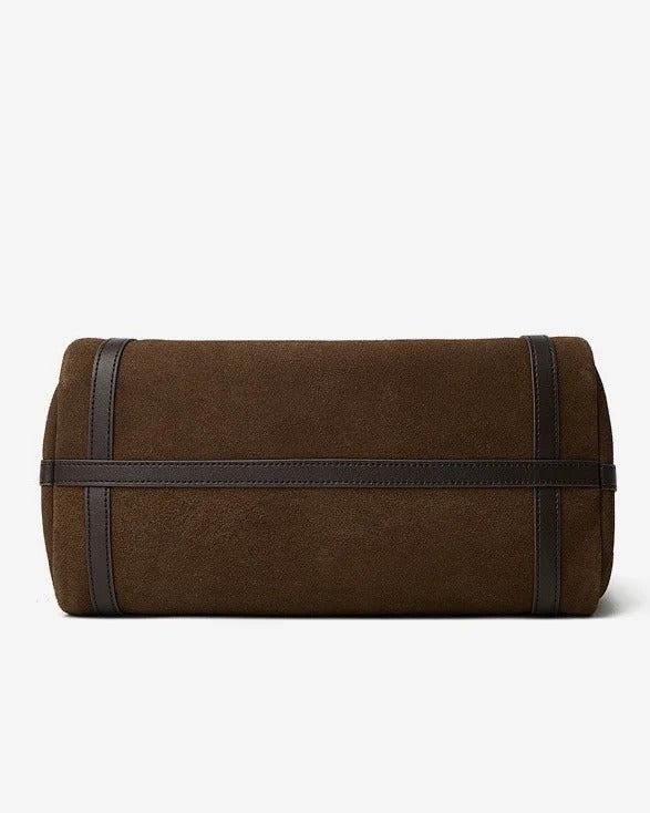 Brown fabric roll with black straps on a white background