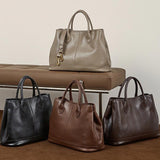 Four Structured Leather Handbags in Black,Chocolate,Brown,Gray
